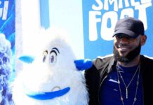 One Friendship Helped Shape LeBron’s Final Chapter LeBron James posing next to a white yeti mascot at a blue-themed event