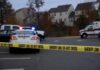 A Daylight Killing Had a Dark Backstory Sheriff's vehicles behind yellow do-not-cross tape