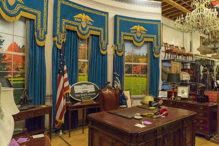 Oval Office-style desk and decor in a museum display