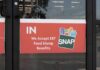Five-Borough Raid Nails Food Stamp Scammers store door sign about EBT SNAP acceptance