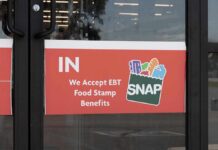 Five-Borough Raid Nails Food Stamp Scammers store door sign about EBT SNAP acceptance