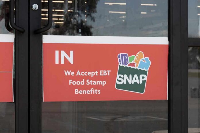 shutterstock_2174412869 store door sign about EBT SNAP acceptance