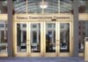 Federal Shockwave: States Sidelined On AI Federal Communications Commission building entrance with gold doors