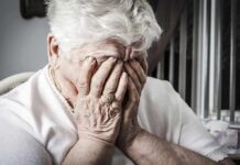 A Familiar Joint Supplement Faces A Troubling Question Elderly woman covering her face with her hands