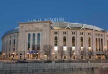 Flag Dash STUNS Yankee Stadium Yankee Stadium exterior at dusk