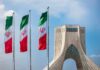 Currency Freefall Triggers Panic Iranian flags beside Azadi Tower in Tehran