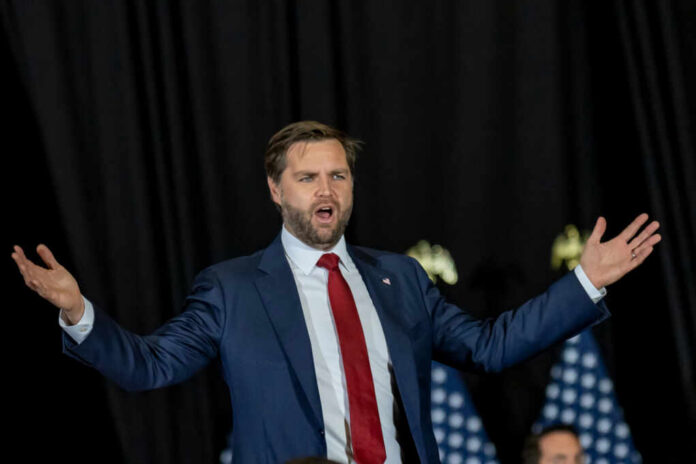 54801cb8-0515-4c34-a2d8-f79705e6683e_shutterstock2542628063jpg.jpeg man in suit speaking with arms outstretched