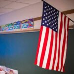 American flag hanging in a classroom