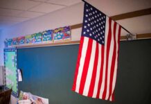American flag hanging in a classroom