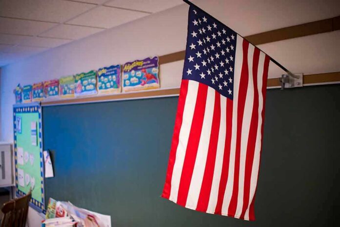 shutterstock_1073388047 American flag hanging in a classroom