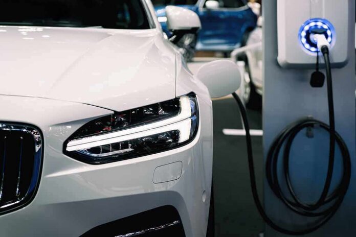 shutterstock_1165397335 electric car charging at a station