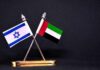 Post-Election Window Turns Volatile Israeli and UAE flags on crossed desk stand