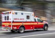 Soccer Saturday Turns Deadly – Families Screamed Ambulance speeding down a city street with lights flashing