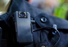 Knife Charge, Split-Second Shots – Why? Body camera clipped to a dark uniform