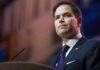 UN Vote Drama: Rubio’s Pressure Play? man in suit speaking at podium