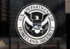 U.S. Department of Homeland Security seal on a building plaque